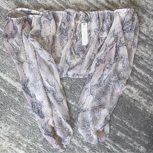 Blush small off the shoulder blouse. Snakeskin Tie front and cropped blouse.